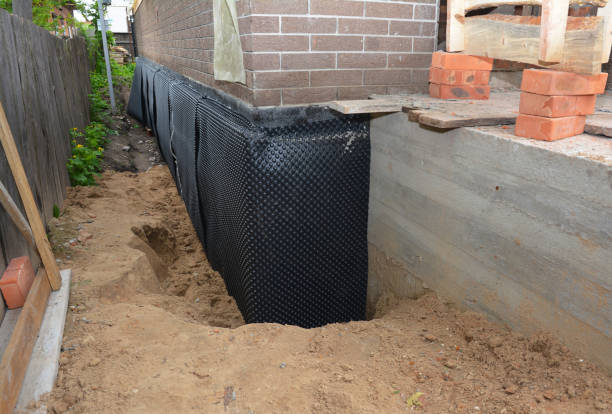 Happy homeowners after waterproofing job in Bellona